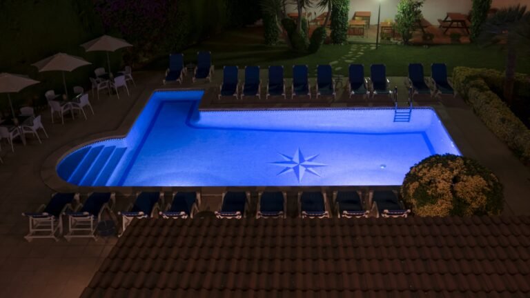 High angle shot of a pool full of warm water  in the garden
